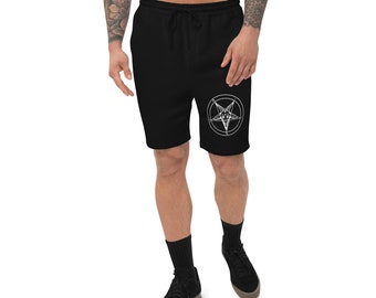 Puede incluir: Pantalones cortos negros con cintura con cordón y un pentagrama blanco en la pierna derecha. Los pantalones cortos están hechos de un material suave, adecuados para uso casual.
