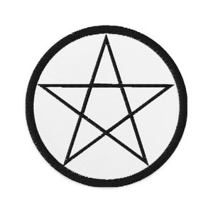 May include: A black and white pentagram symbol inside a black circle. The pentagram is a five-pointed star with a point facing upwards.