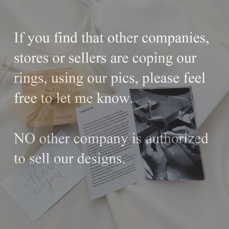 May include: A close-up of a note with the text "NO other company is authorized to sell our designs."  The note is on a white surface with a small wooden box and a black and white photo of a hand working on a piece of jewelry.