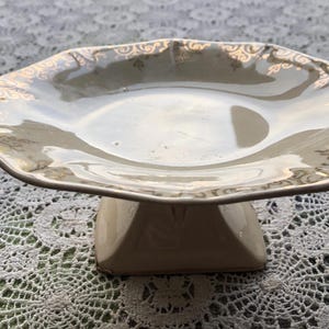 Miniature Cake stand/ compote/ fruit bowl with gilt edging.