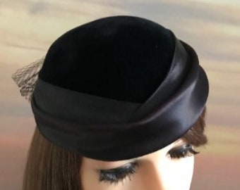 Vintage black velvety and satin occasion hat 1960s with netted bow detailing on the back of hat wedding / garden party / summer / derby
