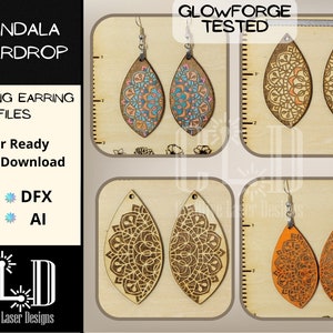 May include: Three sets of laser cut wooden teardrop shaped earrings with mandala designs. The first set is blue, pink, and white. The second set is brown and white. The third set is orange and brown. The image includes the text "GLOWFORGE TESTED".