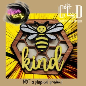 May include: A wooden cutout of a bee in a honeycomb with the word "kind" in yellow lettering. The bee is yellow and black with a white face and wings. The honeycomb is brown and the background is a yellow sunflower.