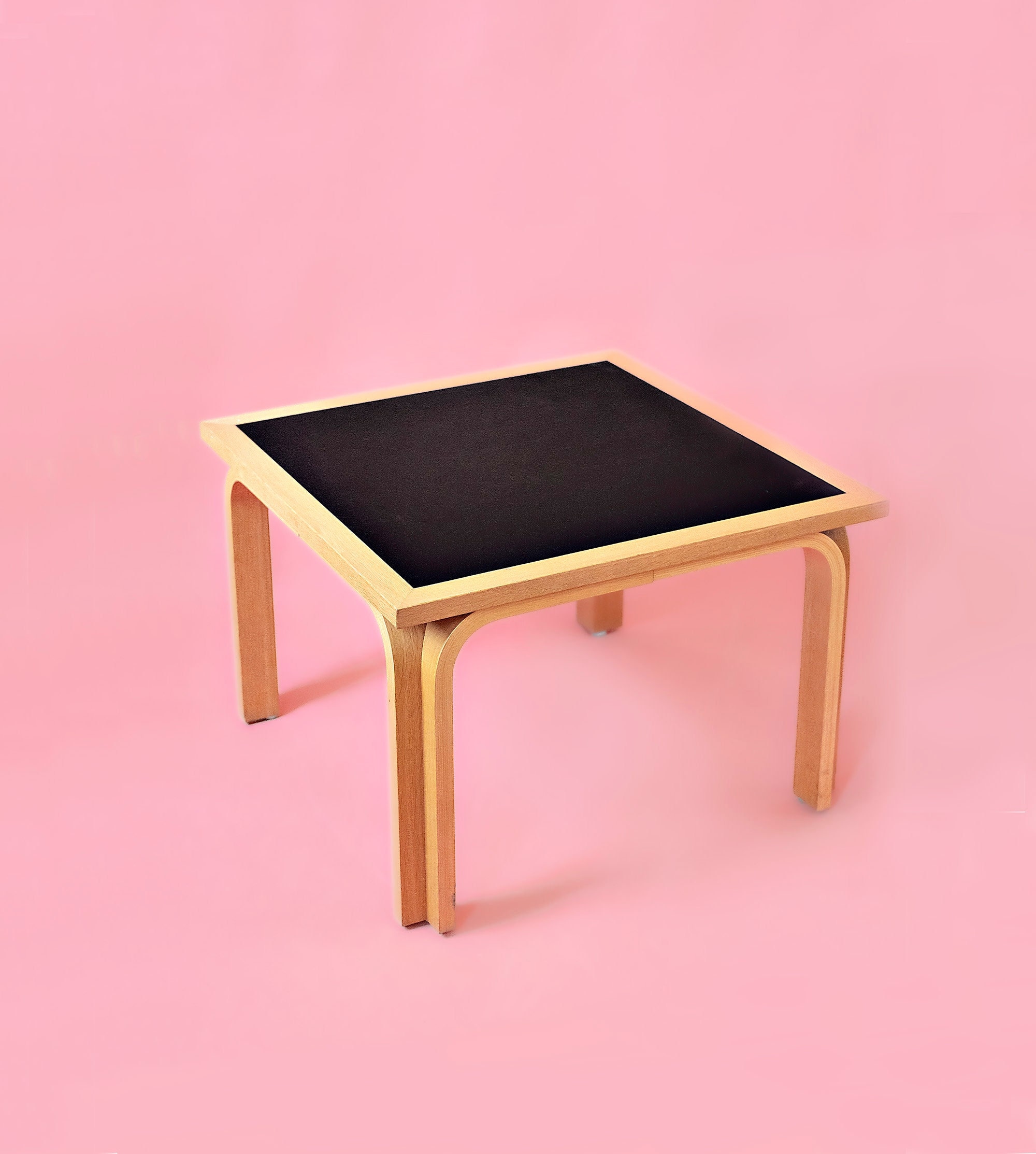 round dining table by Rud Thygesen and Johnny Sorensen for Magnus