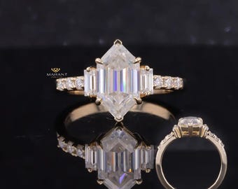 May include: A gold engagement ring with a large, clear, octagon-shaped diamond in the center. The diamond is surrounded by smaller diamonds on the band. The ring is shown on a black background.