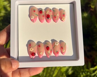 Bella’s Strawberry Lady Patch Acrylic Press on Nails | Almond Nude Pink French Tip Strawberry Ladybug Nails | 3D Handpainted Flower Nails