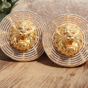 Lejonörhängen i guld: Diamant- och rubinsmycken i sterlingsilver