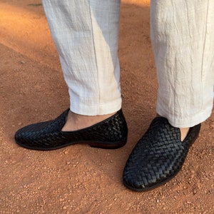 Handmade men’s braided leather shoes featuring a woven design and classic driving moccasin style. These leather loafers offer a comfortable, flexible fit ideal for weddings, groom fashion, and stylish everyday wear. Crafted with detailed braided texture for a refined, elegant look that complements both formal and casual outfits.