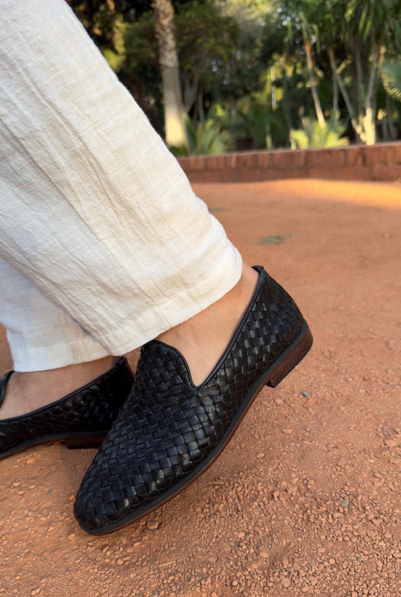 Handmade men’s braided leather shoes featuring a woven design and classic driving moccasin style. These leather loafers offer a comfortable, flexible fit ideal for weddings, groom fashion, and stylish everyday wear. Crafted with detailed braided texture for a refined, elegant look that complements both formal and casual outfits.
