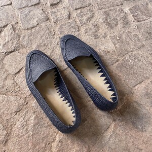 Handmade men’s raffia wedding shoes featuring natural woven fibers and a lightweight loafer design. Perfect for grooms seeking unique, stylish footwear for beach, boho, or summer ceremonies. Comfortable, breathable, and crafted with detailed handwoven texture for an elegant, natural look.