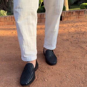 Handmade men’s braided leather shoes featuring a woven design and classic driving moccasin style. These leather loafers offer a comfortable, flexible fit ideal for weddings, groom fashion, and stylish everyday wear. Crafted with detailed braided texture for a refined, elegant look that complements both formal and casual outfits.
