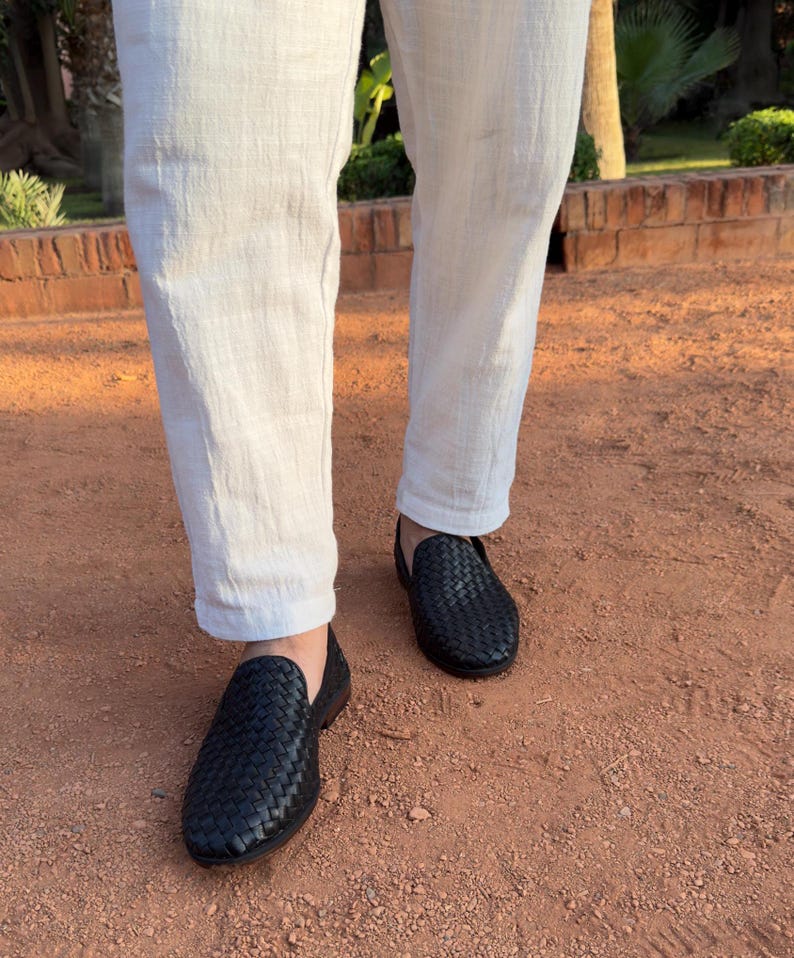 Handmade men’s braided leather shoes featuring a woven design and classic driving moccasin style. These leather loafers offer a comfortable, flexible fit ideal for weddings, groom fashion, and stylish everyday wear. Crafted with detailed braided texture for a refined, elegant look that complements both formal and casual outfits.