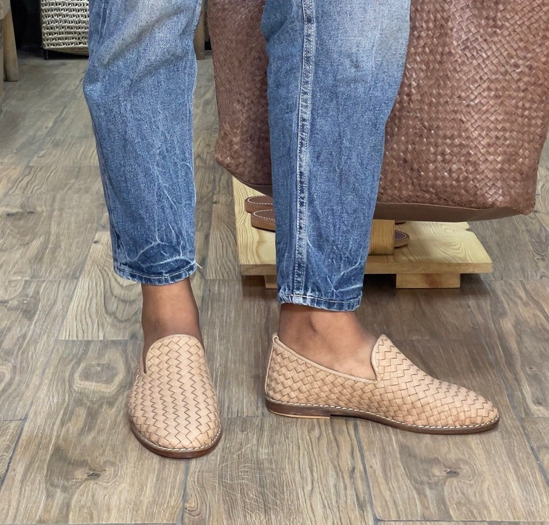 Handmade men’s braided leather shoes featuring a woven design and classic driving moccasin style. These leather loafers offer a comfortable, flexible fit ideal for weddings, groom fashion, and stylish everyday wear. Crafted with detailed braided texture for a refined, elegant look that complements both formal and casual outfits.