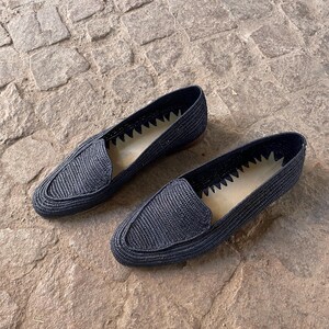 Handmade men’s raffia wedding shoes featuring natural woven fibers and a lightweight loafer design. Perfect for grooms seeking unique, stylish footwear for beach, boho, or summer ceremonies. Comfortable, breathable, and crafted with detailed handwoven texture for an elegant, natural look.