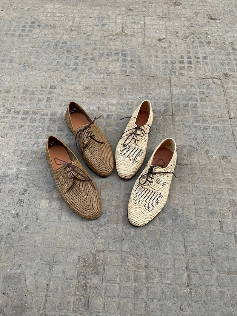 Handmade men’s raffia shoes crafted from natural woven fibers, featuring a lightweight and breathable loafer moccasin design. Ideal for weddings, beach ceremonies, summer outfits, and casual everyday wear. These artisanal raffia loafers offer a stylish, eco-friendly look with detailed handwoven texture, comfortable fit, and classic design suitable for men seeking unique, handcrafted footwear.