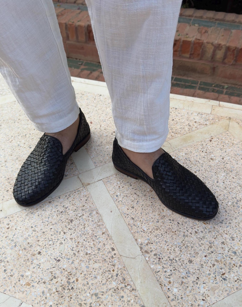 Handmade men’s braided leather shoes featuring a woven design and classic driving moccasin style. These leather loafers offer a comfortable, flexible fit ideal for weddings, groom fashion, and stylish everyday wear. Crafted with detailed braided texture for a refined, elegant look that complements both formal and casual outfits.