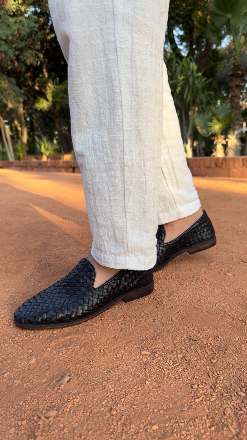 Handmade men’s braided leather shoes featuring a woven design and classic driving moccasin style. These leather loafers offer a comfortable, flexible fit ideal for weddings, groom fashion, and stylish everyday wear. Crafted with detailed braided texture for a refined, elegant look that complements both formal and casual outfits.