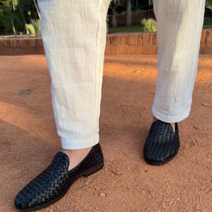Handmade men’s braided leather shoes featuring a woven design and classic driving moccasin style. These leather loafers offer a comfortable, flexible fit ideal for weddings, groom fashion, and stylish everyday wear. Crafted with detailed braided texture for a refined, elegant look that complements both formal and casual outfits.