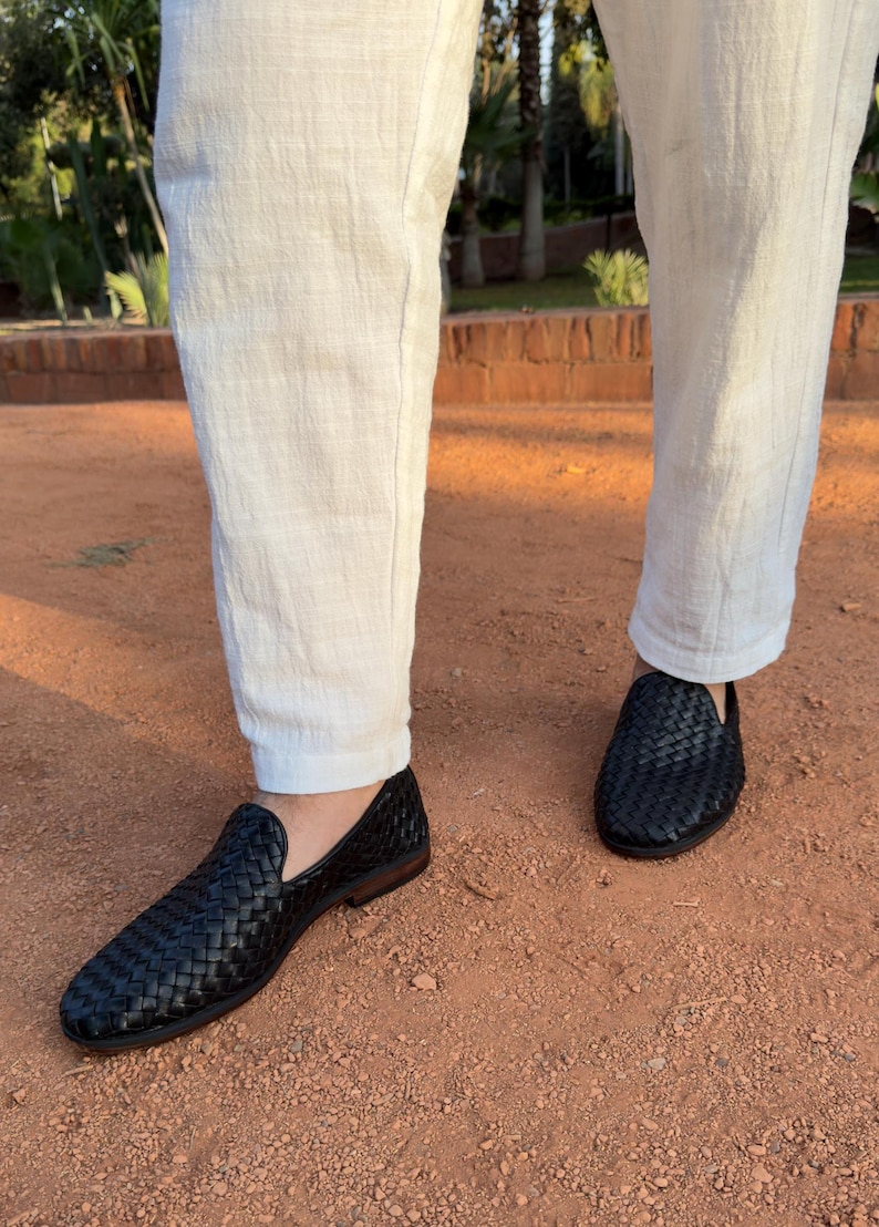 Handmade men’s braided leather shoes featuring a woven design and classic driving moccasin style. These leather loafers offer a comfortable, flexible fit ideal for weddings, groom fashion, and stylish everyday wear. Crafted with detailed braided texture for a refined, elegant look that complements both formal and casual outfits.
