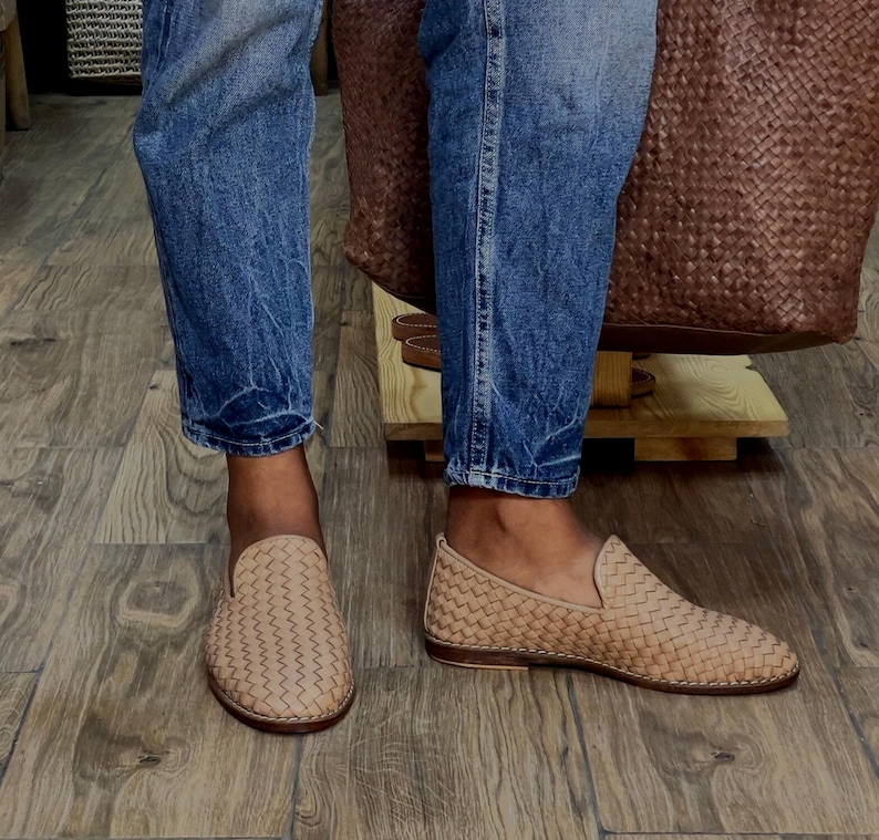 Handmade men’s braided leather shoes featuring a woven design and classic driving moccasin style. These leather loafers offer a comfortable, flexible fit ideal for weddings, groom fashion, and stylish everyday wear. Crafted with detailed braided texture for a refined, elegant look that complements both formal and casual outfits.