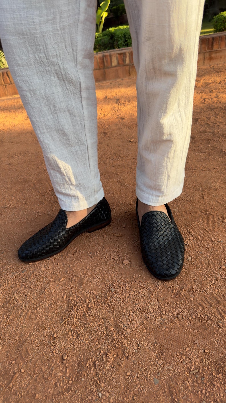 Handmade men’s braided leather shoes featuring a woven design and classic driving moccasin style. These leather loafers offer a comfortable, flexible fit ideal for weddings, groom fashion, and stylish everyday wear. Crafted with detailed braided texture for a refined, elegant look that complements both formal and casual outfits.