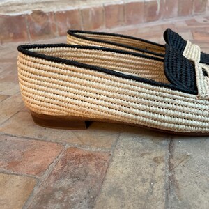 Handmade men’s raffia wedding shoes featuring natural woven fibers and a lightweight loafer design. Perfect for grooms seeking unique, stylish footwear for beach, boho, or summer ceremonies. Comfortable, breathable, and crafted with detailed handwoven texture for an elegant, natural look.