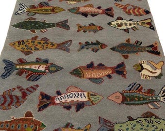 High quality and design Tibetan rug in beige background and colorful fish  nepali rug for living room and home decor rug.