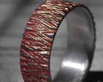 Red and gold interwoven ring