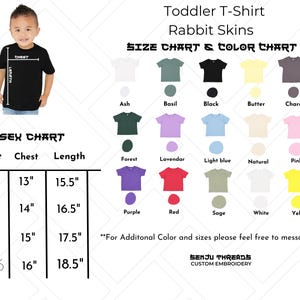 Puede incluir: Una tabla de tallas y colores de camisetas para ni&ntilde;os peque&ntilde;os Rabbit Skins con una camiseta negra, una cuadr&iacute;cula de quince iconos de camisetas de colores con etiquetas y una tabla de tallas unisex con medidas en pulgadas para 2T, 3T, 4T y 5/6.