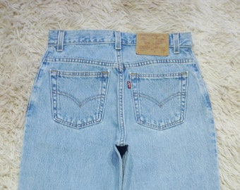 Vintage Y2K Levi's 550 Jeans Women Waist 26.5 Distressed Light Wash Denim Relaxed Fit Tapered Leg High Waist Mom Jeans Made in USA W26.5 L29