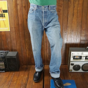 Vintage 90s Levi&#39;s 501 Distress Button Fly Mid Rise Jeans – Straight Cut Faded Blue Denim Made in USA Size W32