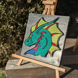 May include: A set of three ceramic mugs with a speckled, matte finish. The mugs are in shades of cream, light gray, and dark gray. Each mug has a simple, minimalist design, perfect for coffee or tea.