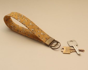 Key Fob Wristlet - Wrist Lanyard - Cute Kawaii Keychain - Mustard Background Wildflower Print - Dark Gold Hardware