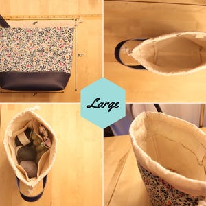 May include: A large, white cotton drawstring bag with a floral print lining. The bag is 10.5 inches tall and 6 inches wide. The bag is shown with yarn balls inside.