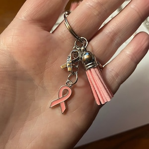 Breast cancer awareness keychains.