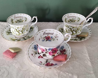 Tazza e piattino Royal Albert, serie "Fiore del mese". Porcellana inglese di alta qualità.
