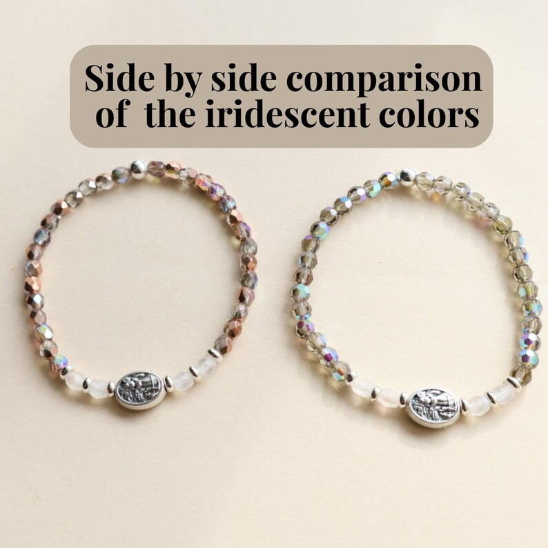 May include: Two beaded bracelets with iridescent colors are displayed side by side. Each bracelet features a central oval charm and is composed of small, faceted beads in shades of silver, pink, and clear. The text "Side by side comparison of the iridescent colors" is at the top.