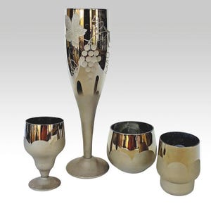 Set of vintage glass glasses with mirror effect for various drinks