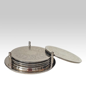 Set of 6 Silver plated metal round coasters with holder