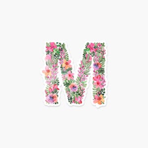 May include: The letter M is formed with watercolor flowers in shades of pink, purple, and orange. The flowers are surrounded by green leaves.