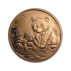 May include: A copper-colored coin with a detailed image of two pandas, one adult and one cub, in a bamboo forest setting.