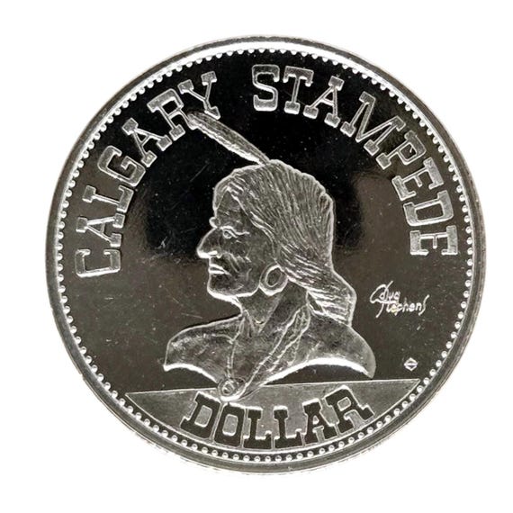 USDビンテージ1977★スターリングシルバー製★ロンドン★シルエットアート 1977 Vintage Calgary Stampede Trade Dollar Token - Treaty 7