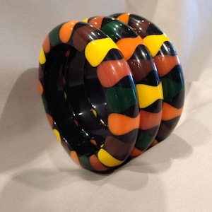 Three Black Bakelite Style Bowtie Bangle Bracelets