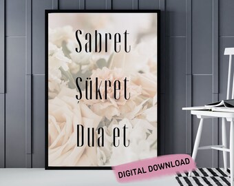 May include: A printable digital download featuring a floral background with the text "Sabret Sukret Dua et" in black.