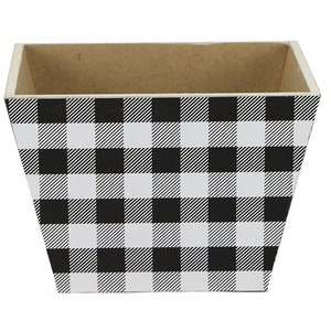 May include: A black and white checkered wooden planter. The planter is a rectangular shape with a slight taper at the top.