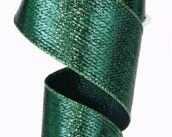 May include: A roll of 2.5 inch wide emerald green wired ribbon with a metallic sheen. The ribbon has a textured surface and is perfect for crafting and decorating.