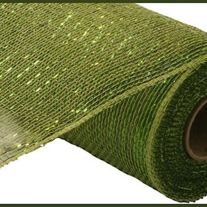 May include: A roll of green metallic mesh ribbon with a glittery finish. The ribbon is rolled up on a cardboard tube.