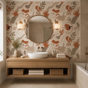 Può includere: Un mobile da bagno in legno chiaro con due cassetti e un ripiano aperto contenente due cesti intrecciati e asciugamani piegati. Un lavabo bianco è posizionato sopra, centrato sotto uno specchio rotondo e due lampade da parete sferiche.