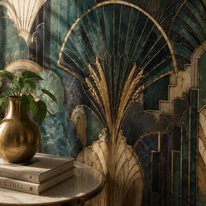 May include: A brass vase containing a green leafy plant sits atop two stacked books on a round table. The background features wallpaper with a repeating fan-shaped pattern in shades of deep teal, dark blue, and gold, creating a geometric design.