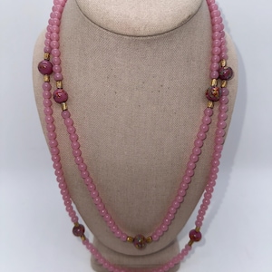 Vintage 1960’s long pink and gold tone beaded necklace
